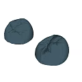 Two Comfortable Blue Bean Bag Chairs on Gray Floor Against Gray Wall Interior