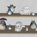 Cute Plush Totoro Stuffed Toys with Umbrella Bus Shaped Figures on Wooden Shelf