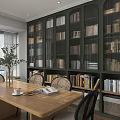 Modern Interior Design With Dark Green Wooden Bookshelves Filled With Books Dining Table And Plant