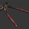 Professional Hardware Tool Pliers with Metal Jaws and Red Handles on Dark Background