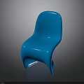 Sleek Blue Chair Featuring Curved Ergonomic Design And Smooth Plastic Surface Against Dark Background