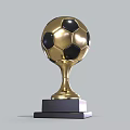 Golden Football Shaped Trophy With Shiny Surface And Black Base Design