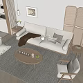 Modern Living Room Sofa Coffee Table Combination With Beige Throw Pillows And Round Wooden Top