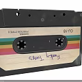 Vintage Black Cassette Tape With Colorful Stripes And Handwritten Gary Hart Label