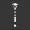 Ancient Ornate Weapon With Long Metal Handle And Red Decorative Top