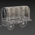 Vintage Covered Wagon With Tattered Canvas Top And Wooden Wheels