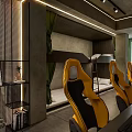 Modern Hotel Guest Room With Yellow Seats And TV Screens In Lounge Area