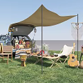 Outdoor Table Setup For Camping With Canopy Car Chairs And Decorative Items On Grass