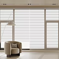 Light Colored Venetian Blinds on Large Window with Armchair and Floor Lamp in Modern Interior