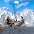 Indoor Snow Mountain Scene With Girls Interacting At Table And Telescope