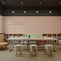 Kindergarten Learning Space With Large Wooden Table Small Stools And Children's Paintings On Wall