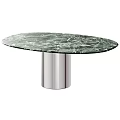 Stylish Restaurant Interior Showcasing Red And Green Marble Tabletops With Metal Pedestal Bases