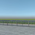Metal Grid Design Fence With Green Grass Blue Sky And Neatly Paved Ground
