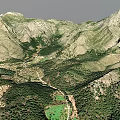 Scenic Mountain Landscape With Rolling Peaks Rocky Surfaces And Green Vegetation
