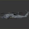 Two Military Helicopters Parked On Reflective Ground With Gray Body And Rotors