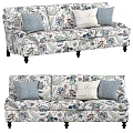 Three Seater Floral Pattern Upholstered Sofa With Blue Green Accents And Decorative Cushions