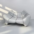 Modern Beige Leather Two Seater Sofa With Unique Curved Shape And Stitched Details