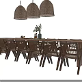Rustic Dining Table Set with Woven Chairs Three Woven Pendant Lights and Table Plant Decor
