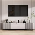 Modern White Ribbed TV Stand With Drawers Decorative Items And Potted Plant