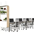 Modern Office Desk Setup With Multiple Computers Ergonomic Chairs And Green Plant Shelves