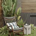 Outdoor Wooden Frame Leisure Chair With Grey Cushion And Striped Pillow Surrounded By Green Plants