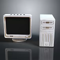 Vintage Computer Setup With CRT Monitor And Desktop Tower On Reflective Surface