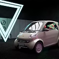 Light Beige Compact Car With Neon Triangle And Circular Decorations On Stage 3d model