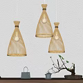 Rattan Conical Pendant Lights in Minimalist Interior With Tea Set And Small Plant