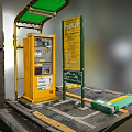 Yellow Ticket Machine With Green Roof And Information Board On Platform Ground
