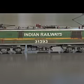 Indian Railways Train 31393 With Green And Yellow Stripes Design
