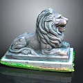 Stone Lion Statue In Lying Posture With Mane On Base And Green Grass