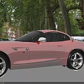 Red BMW Two Door Sports Car With Sleek Body And Silver Alloy Wheels