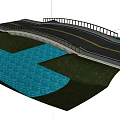 Two Lane Road Bridge With Guardrail Spanning Over Water And Green Bank
