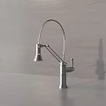Modern Silver Bathroom Accessories Featuring Curved Gooseneck Faucet With Metal Base And Grey Countertop