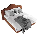 Textured Fabric Upholstered Brown Headboard Bed With Gray Pillows And Blanket