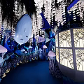 Whimsical Underwater Scene with Giant Whale Jellyfish Coral Seagrass and Illuminated Decorations