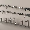 Modern Stainless Steel Faucets in Various Designs Displayed on Wall and Shelf