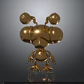 Golden Mechanical Character And Creature With Spherical Head Parts Hexagonal Body And Claw Feet
