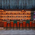Modern Bar Interior Design With Neon Lights Colorful Flags Wine Racks And Casual Seating