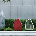 Outdoor Signage With Red And White Frames Near Large Rock Gray Wall And Green Shrubs