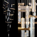 Modern Transparent Cylindrical Chandelier With Gold Metal Frame And Hanging Light Bars