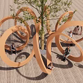 Outdoor Chair with Circular Orange Design Where People Sit Around a Tree for Relaxation