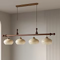 Wooden Chandelier with Four White Lampshades and Decorative Balls on Light Wall with Vertical Stripes
