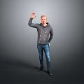 A Man Waving Hand In Gray Hoodie And Blue Jeans Against Gray Background