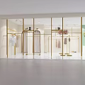 Belllettier Clothing Store With Hanging Clothes On Gold Racks And Modern Interior