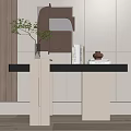Modern Console Table with Green Plant Vase Books and Decor on Light Colored Wall