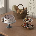 Delicious Cake and Bread Basket with Multi Tiered Dessert Stand on Wooden Table