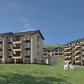 Modern Multi Story Residential Building With Green Lawn White Deer And Mountain View