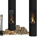 Black Cylindrical Fireplace with Glass Door Burning Fire Wood Logs and Fireplace Tools