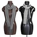 Fashion Mannequins Displaying Knitted Scarves In Black Brown Wooden Textured Stands